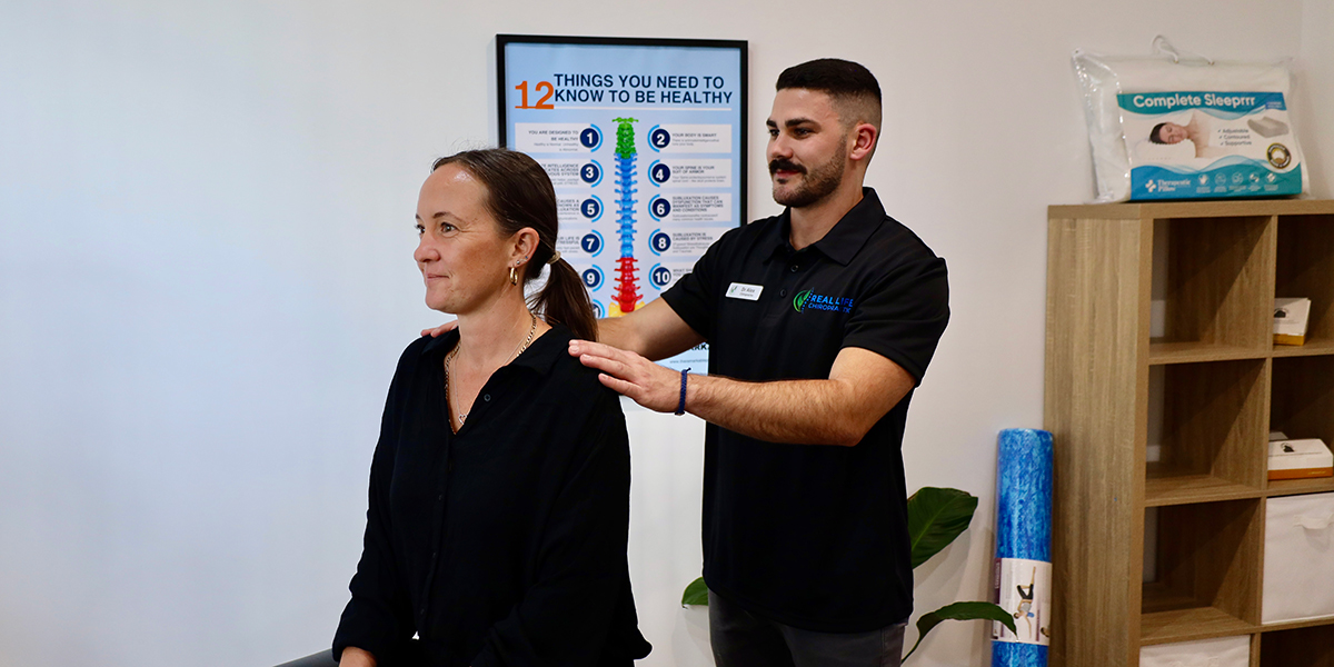 Dr-Alex-Adjusting-Patients-Shoulders