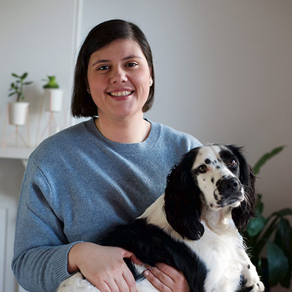 Dr Lence holding dog