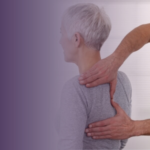 Woman receiving chiropractic care