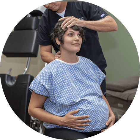 Pregnant woman getting adjustment