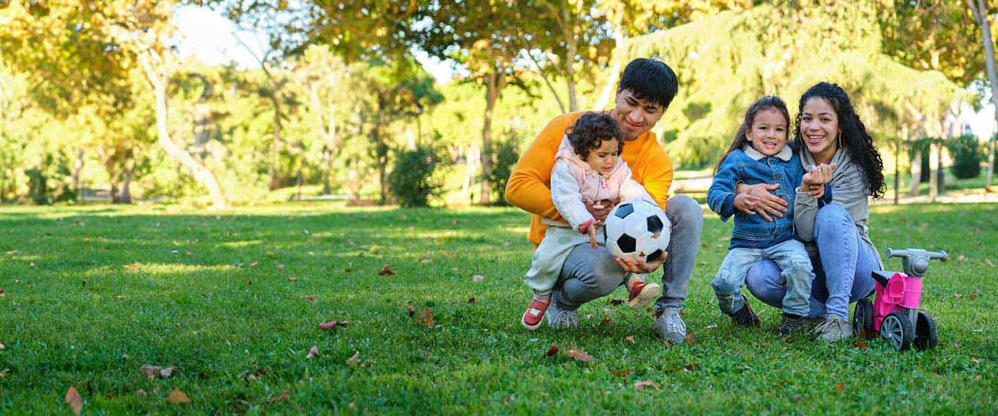 Family playing in the park