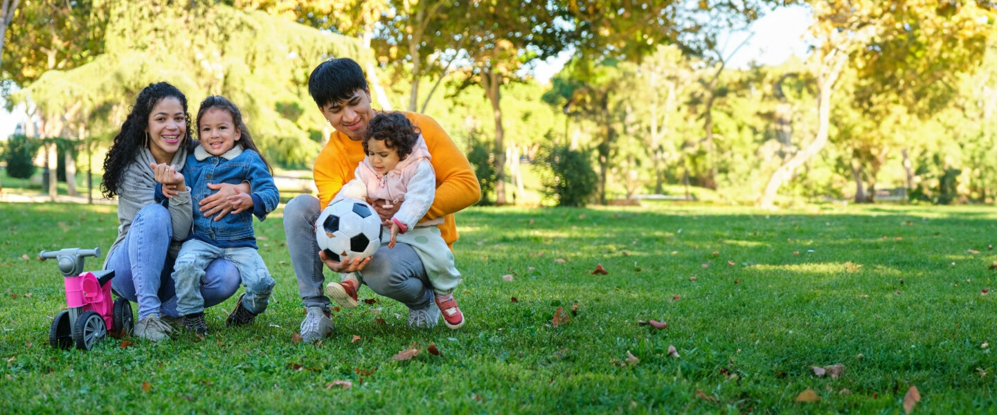 Family playing in the park