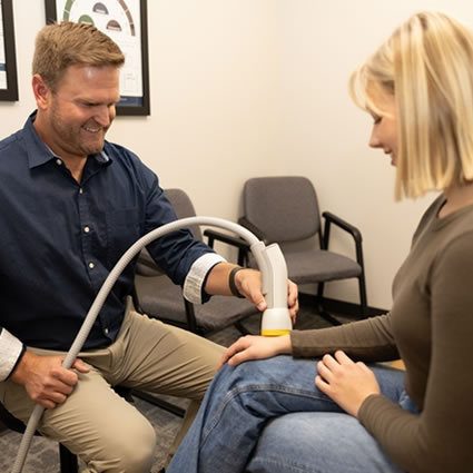 softawave therapy on persons arm
