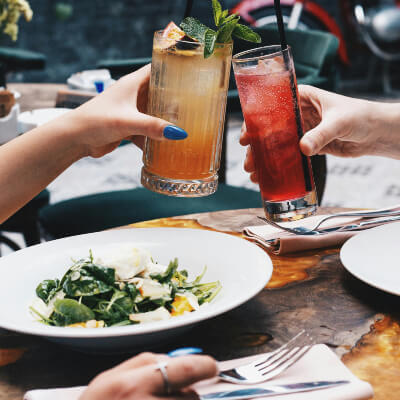 people having lunch and drinks