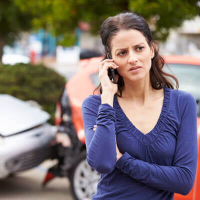woman calling after car accident