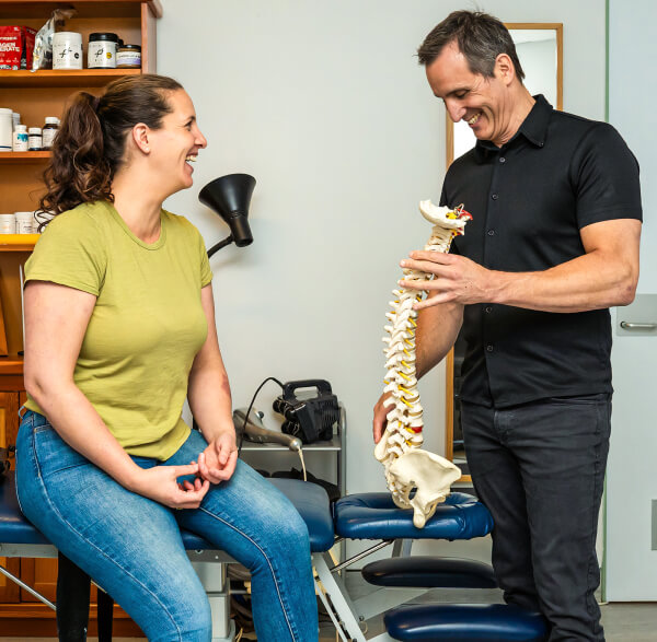 Dr. Paul laughing with Patient