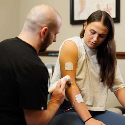 Glen Carbon Chiropractor doing ultrasound on arm