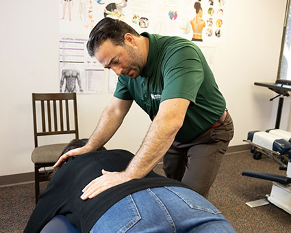 Patient receiving chiropractic adjustment