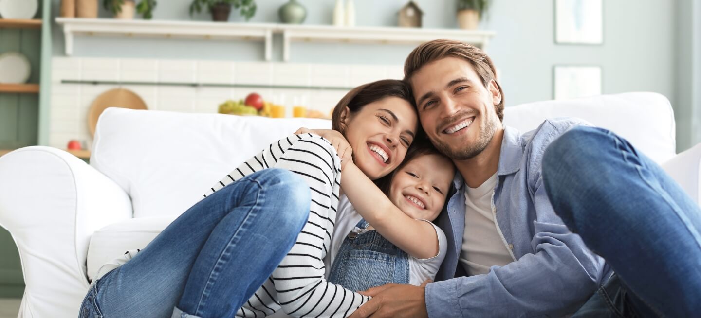 family of three on couch