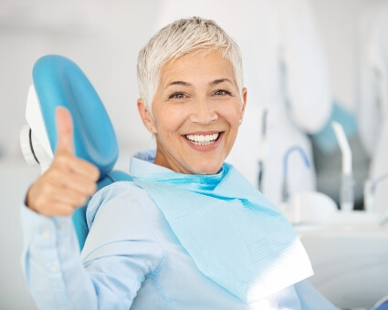 Female patient sitting on dental chair