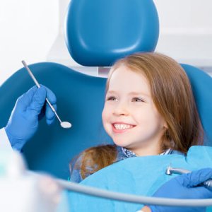 Girl showing dentist her smile