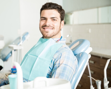 Smiling male dental patient