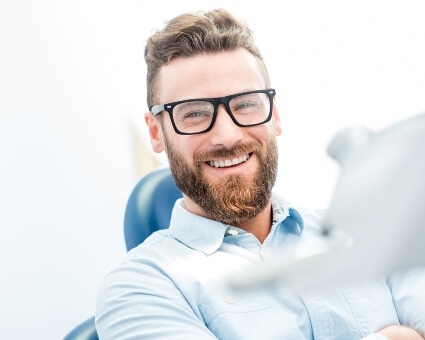Man sitting in dental chair
