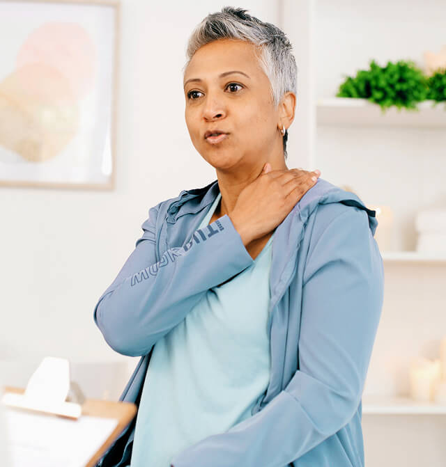 patient holding back of the neck