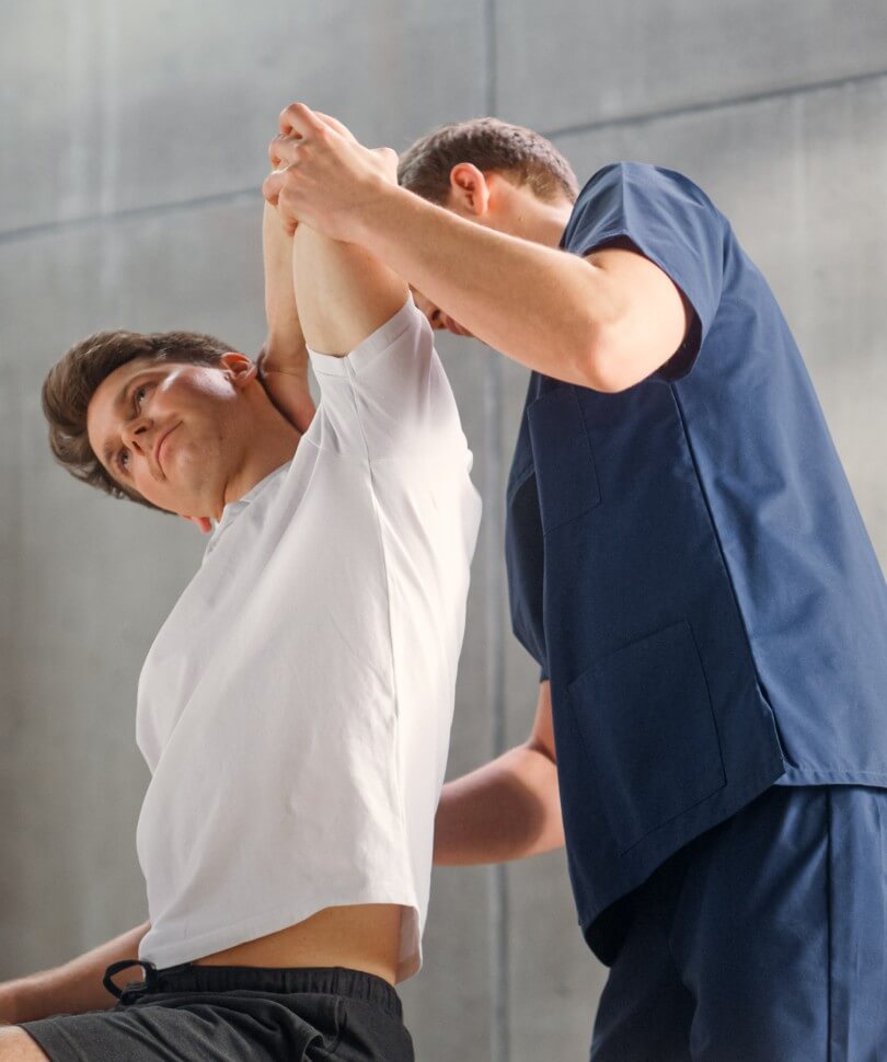 doctor strecthing patient