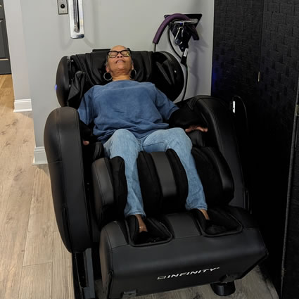 Patient in massage chair