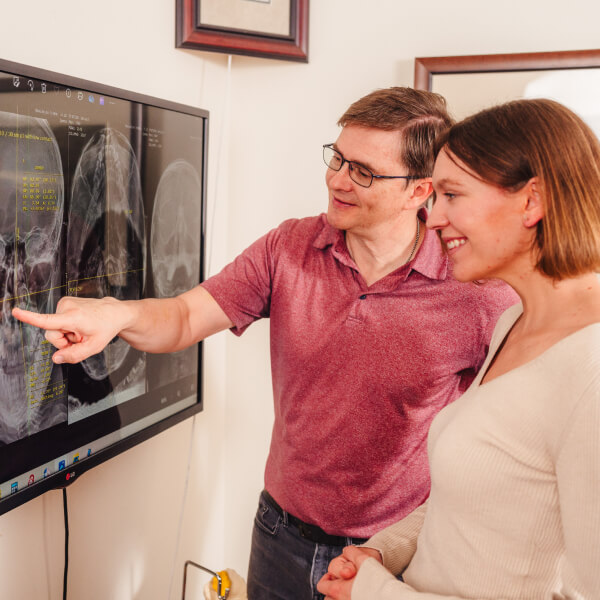 Naperville chiropractor Dr Haug reviewing xrays with patient