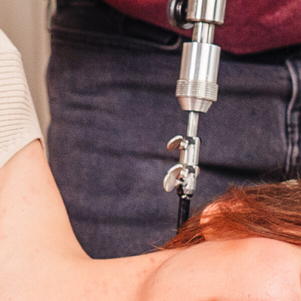 adjusting tool on patients neck