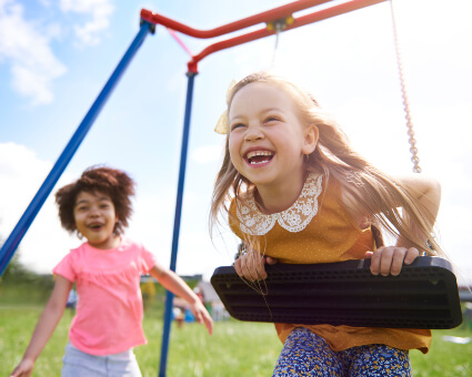 Kids playing on swing