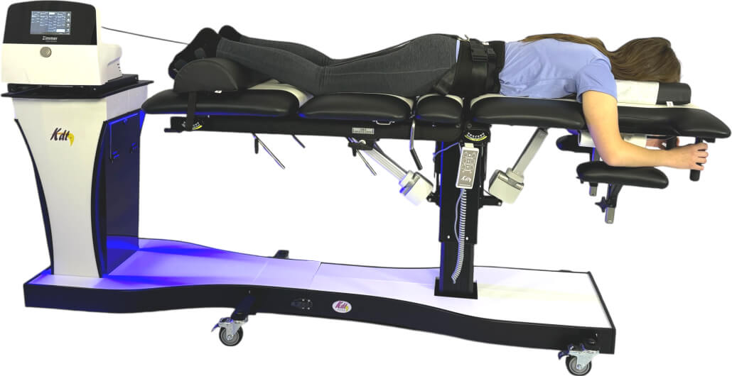 Woman laying on Spinal Decompression Table