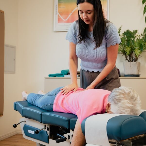 Senior patient back adjustment