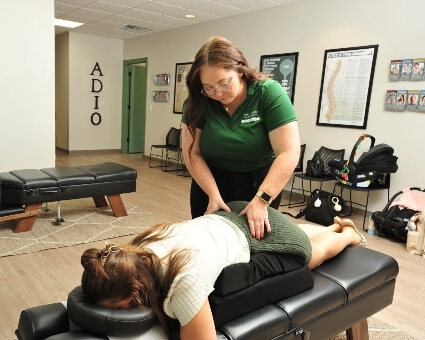 Dr. Darby Adjusting Pregnant Patient