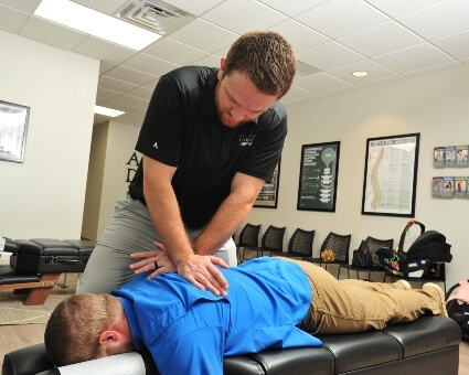Upper-back adjustment used on male patient