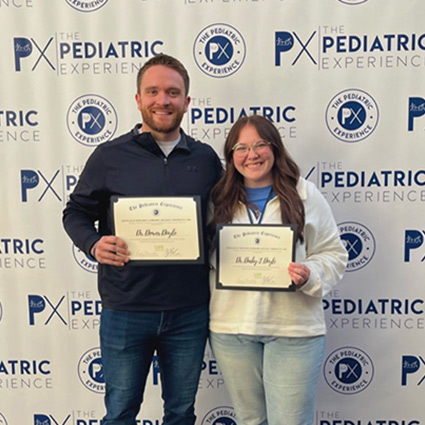 our doctors holding certificates