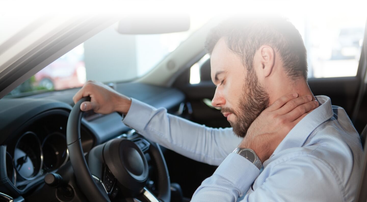 person with neck pain after car accident