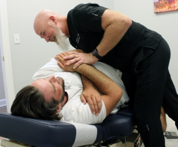 person having back adjusted