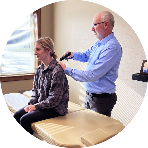 Dr. Jeremy Meusslin checking patient