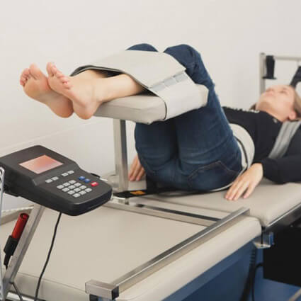 spinal decompression therapy on female patient