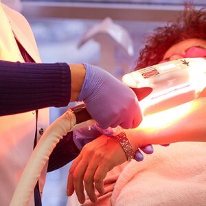 laser therapy on female patient