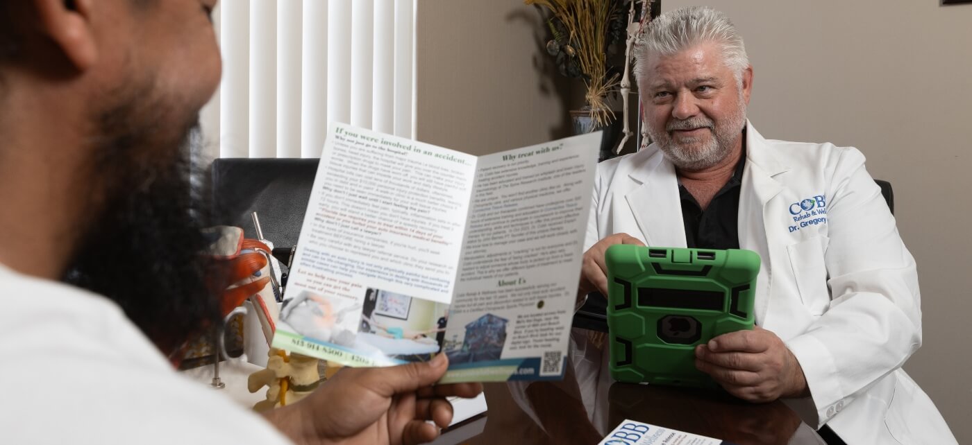 Tampa chiropractor in a consultation with a patient