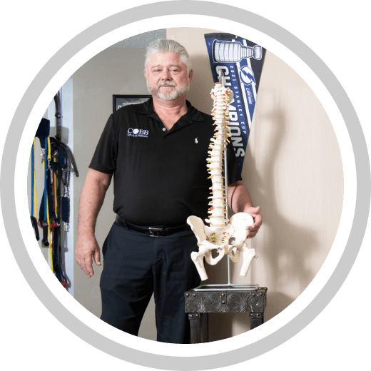 Dr. Gregory Cobb with spine model