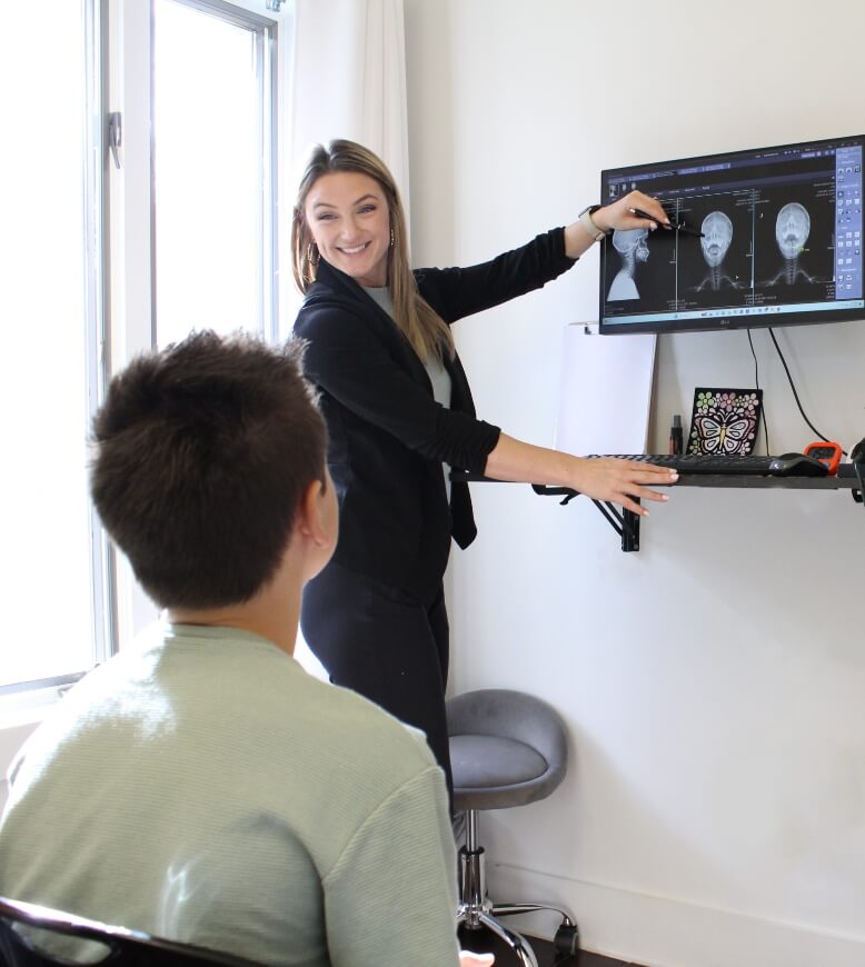 Dr. Julia reviewing x-ray with patient