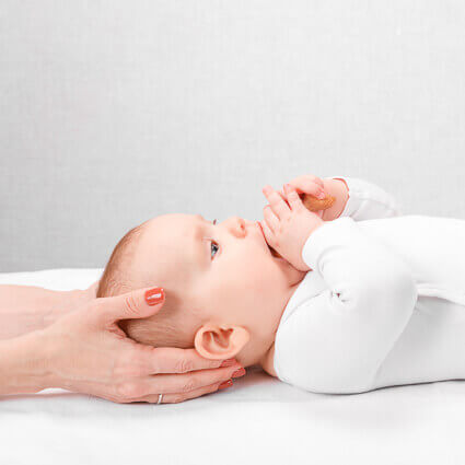 baby during chiropractic adjustment