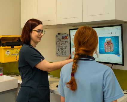 Staff reviewing mouth scan