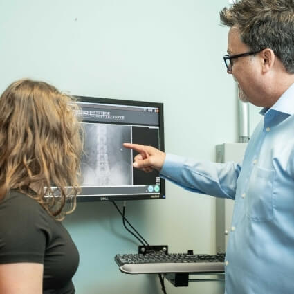 Arlington Heights chiropractor Dr Kevin explaining xrays