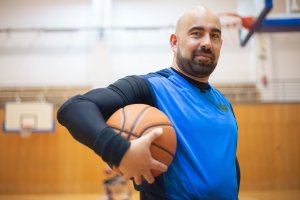 older man with basketball