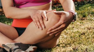 Close-up of a woman sitting cross-legged, inflation.