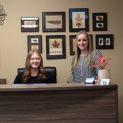 Our front desk staff smiling