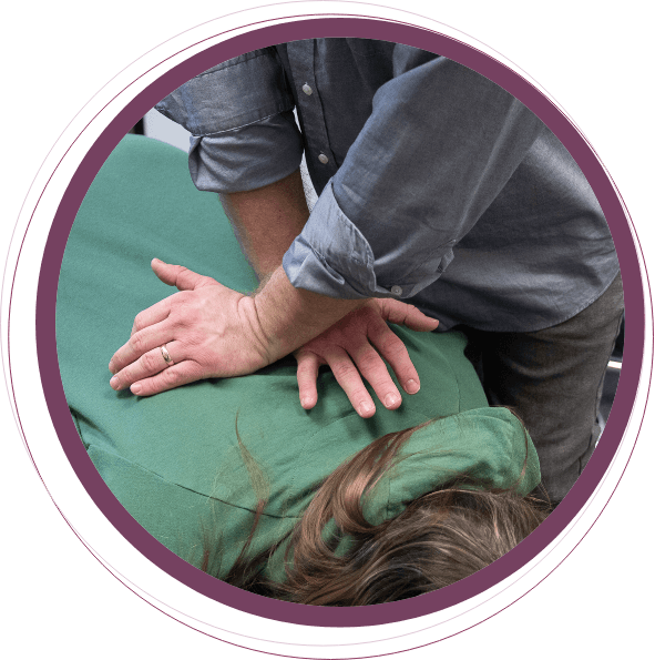 McMinnville chiropractor Dr Jason adjusting patients back