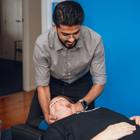 adjusting patient's back