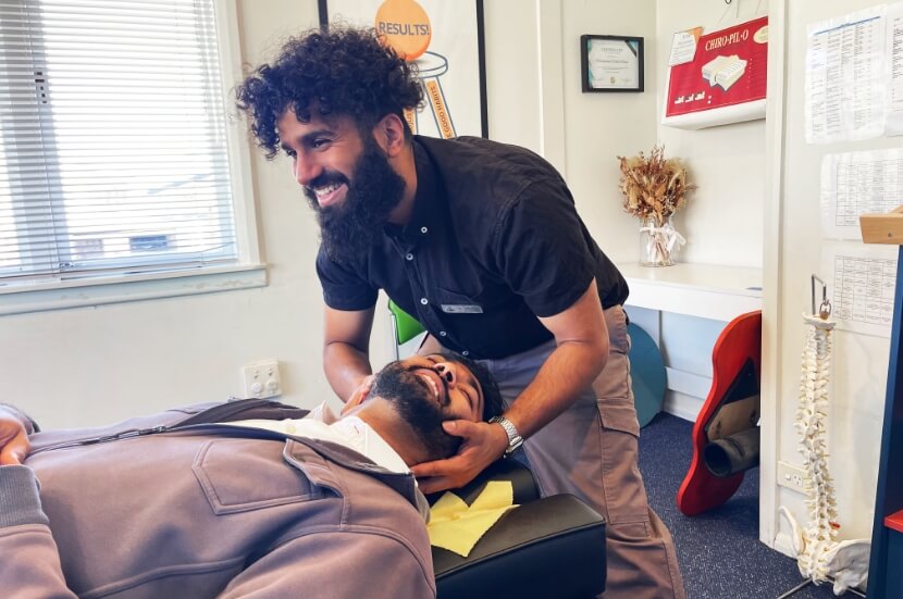 doctor making neck adjusments on he patient