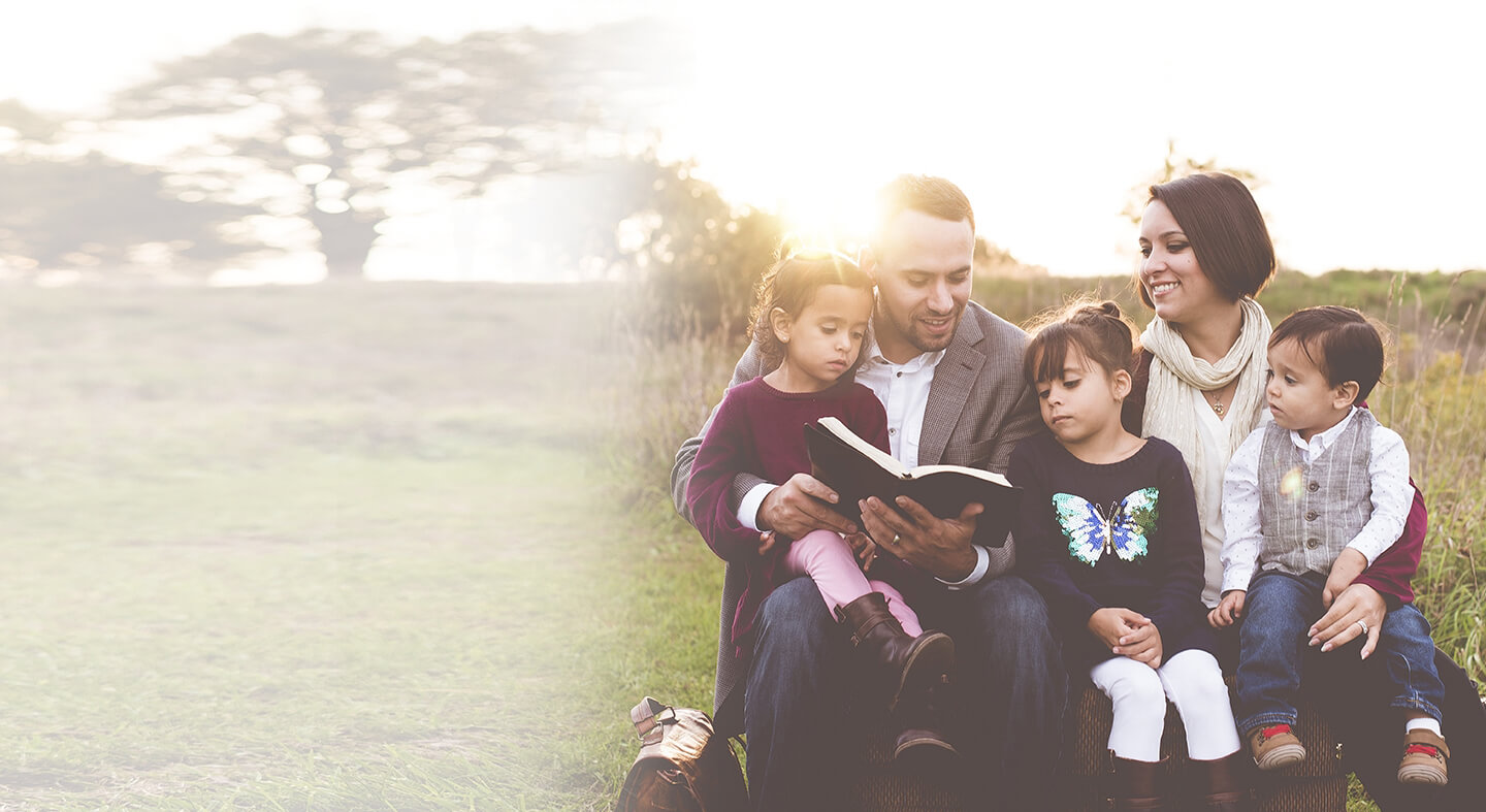 family reading a book