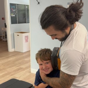 dr-devin-playtime-with-child-patient