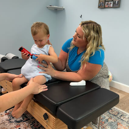 Child on adjusting table