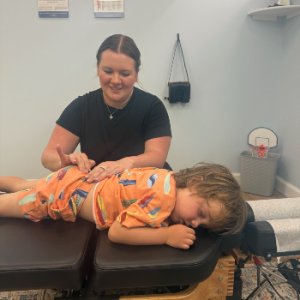 child on adjusting table