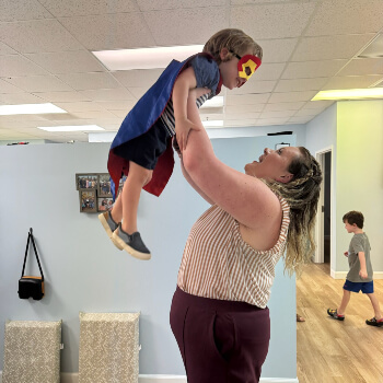 holding up child